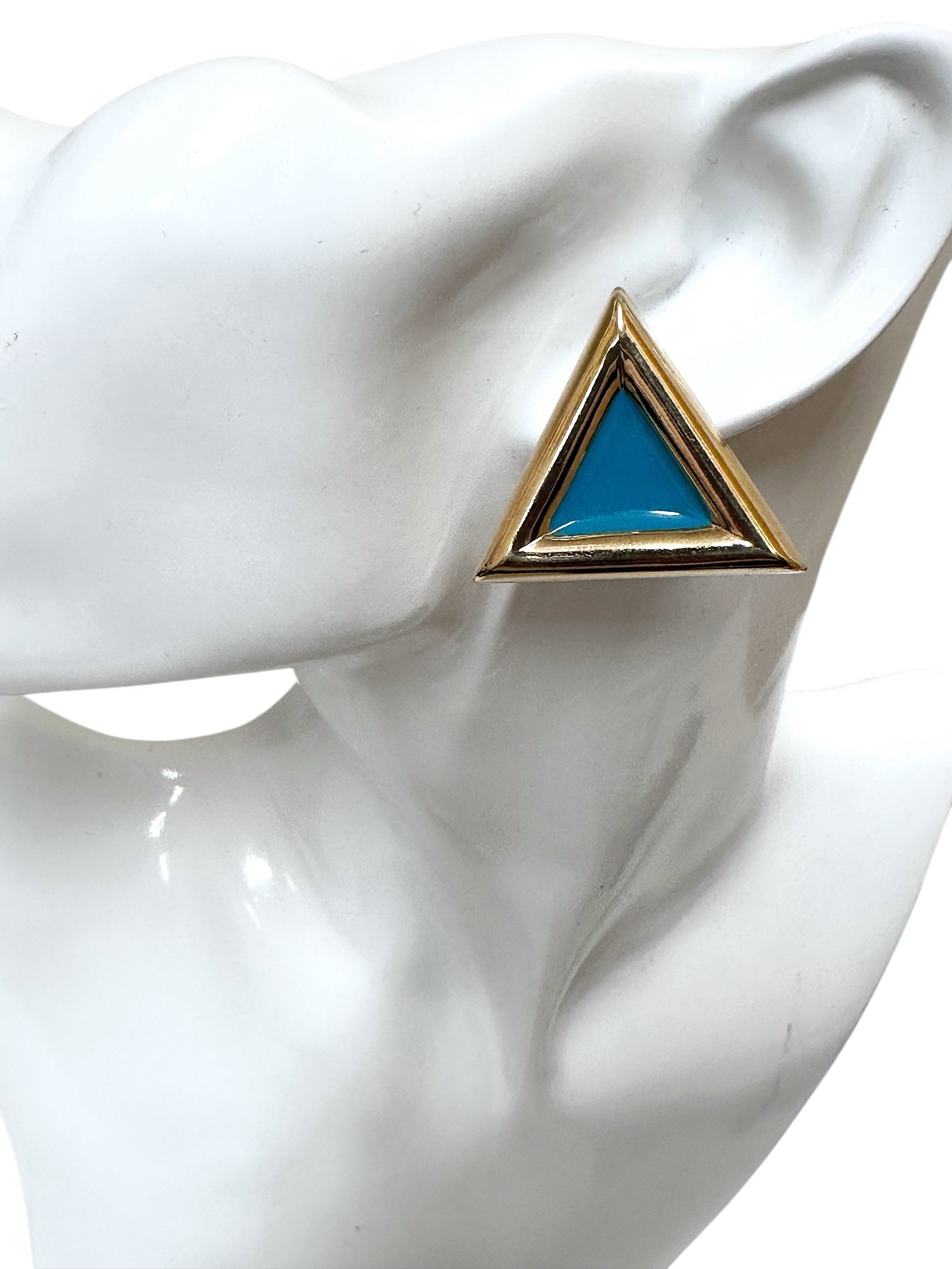Turquoise enamel gold tone triangular stud earrings for pierced ears.