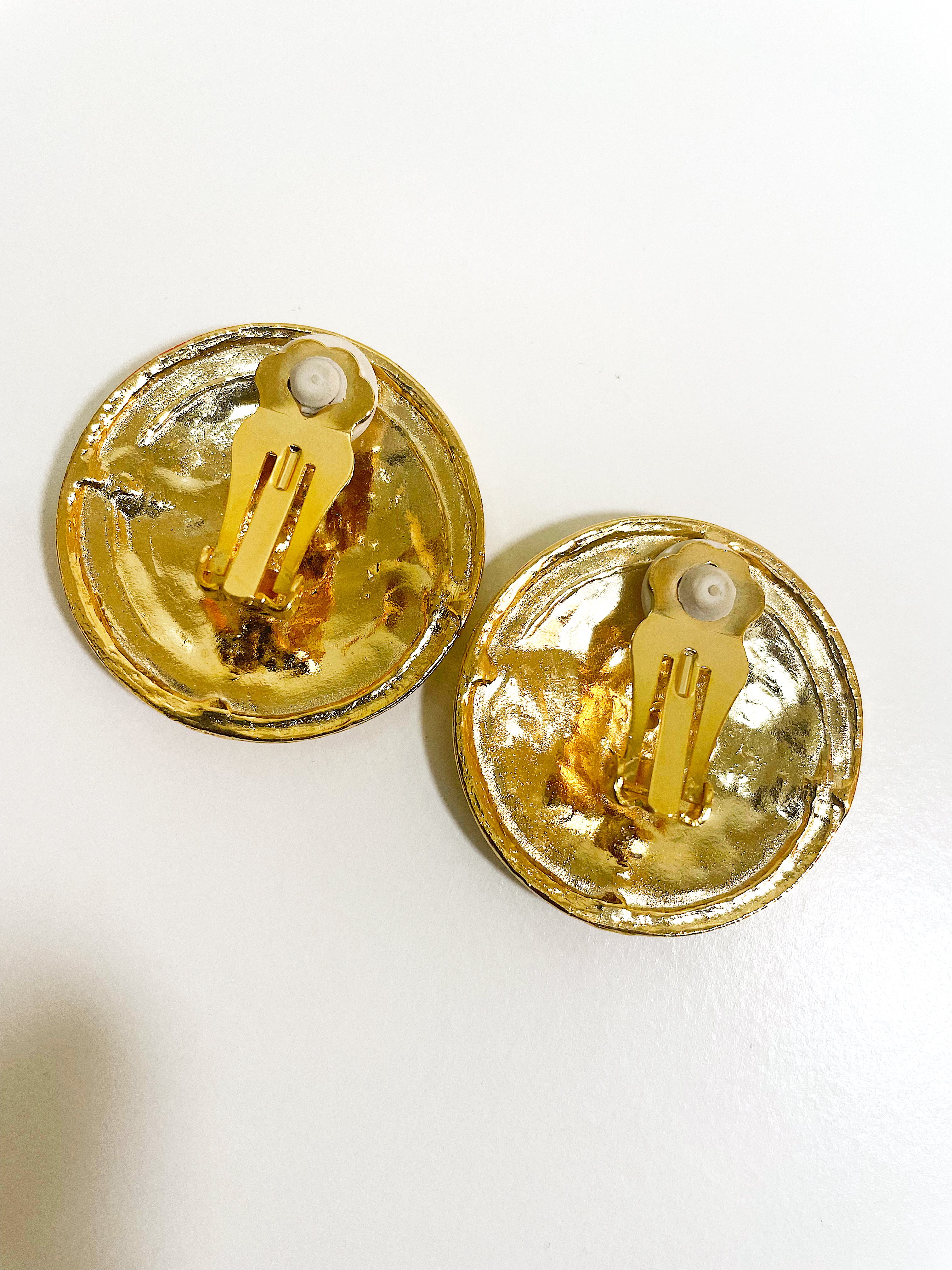 Large gold plated round swirl disc button clip on earrings.