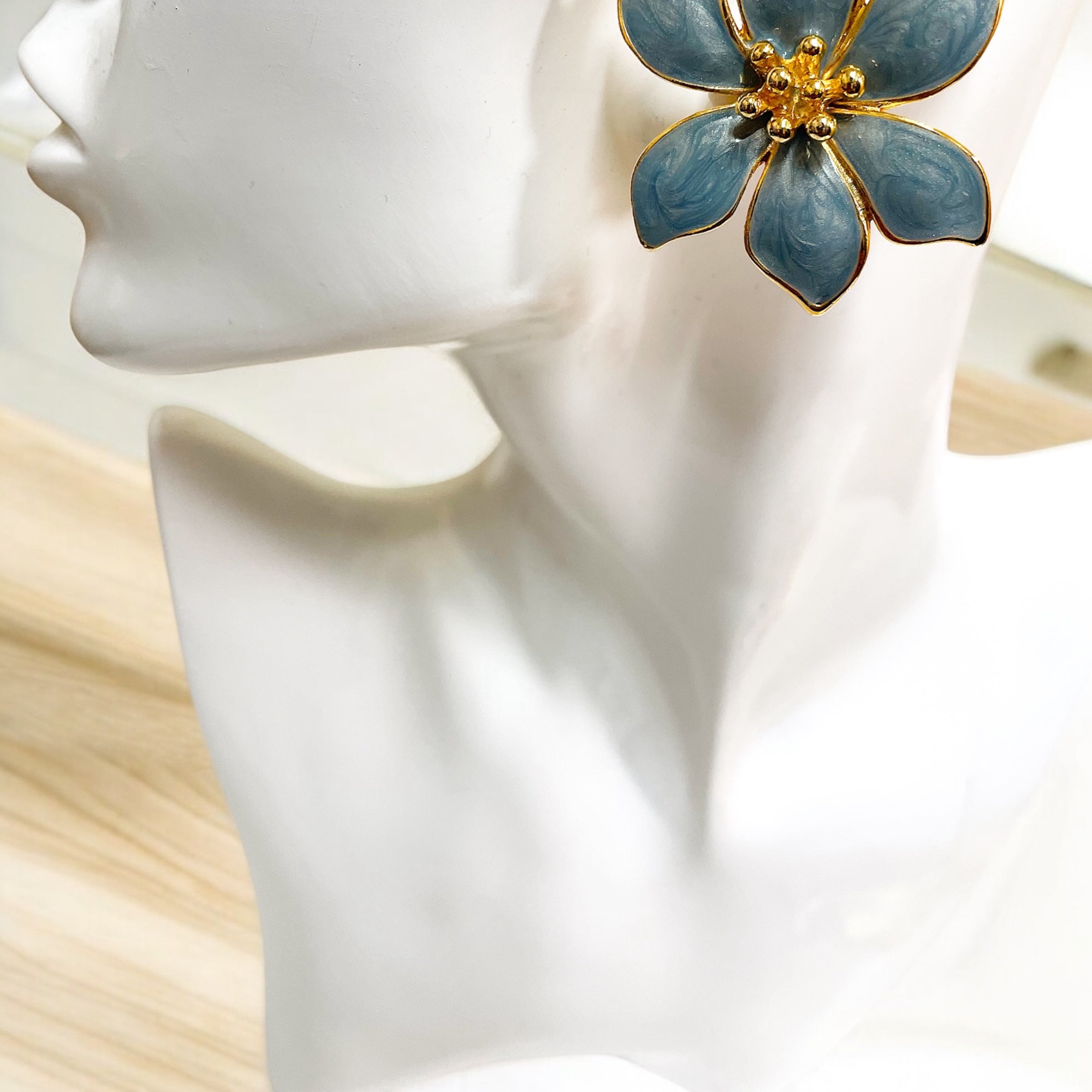 Blue enamel flower stud clip on earrings