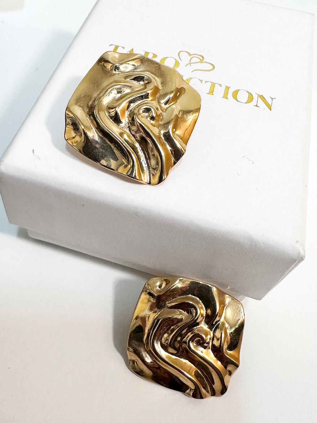 Retro style textured gold plated square clip on earrings.