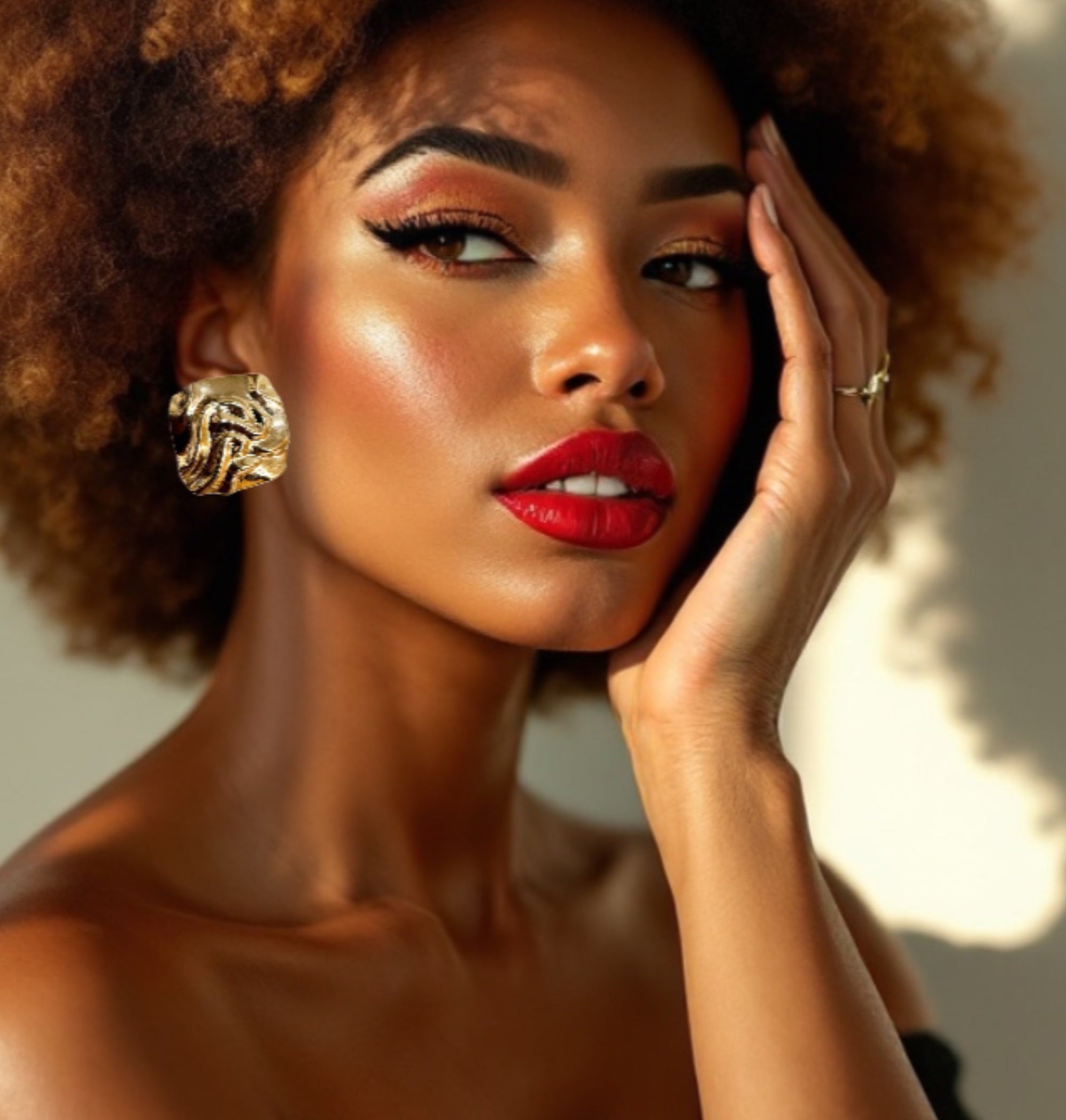 Retro style textured gold plated square clip on earrings.