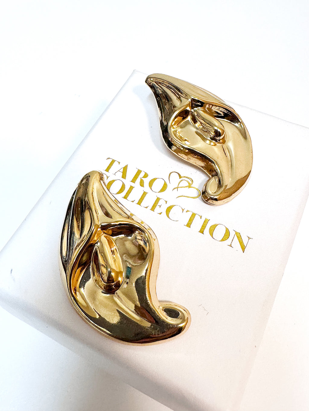 Peace lily flower gold stud statement earrings for pierced ears.