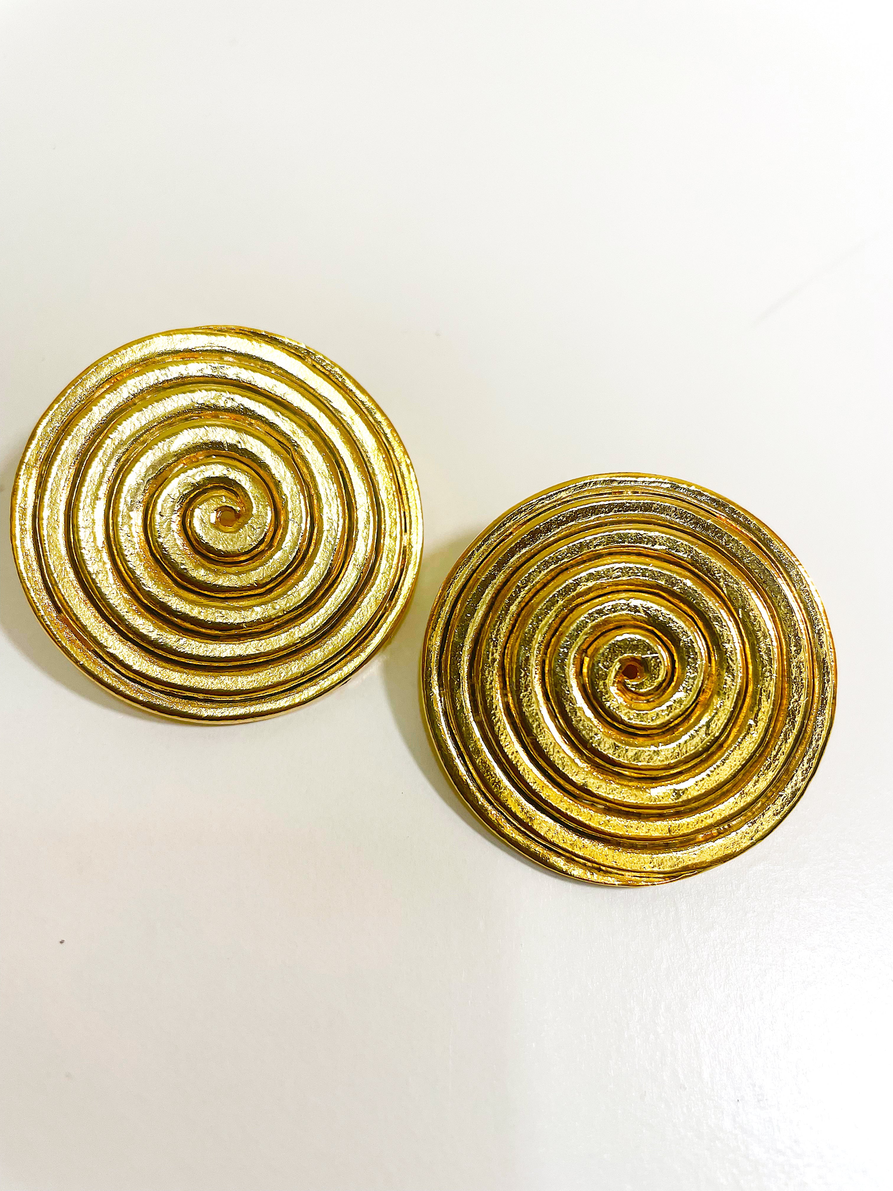 Large gold plated round swirl disc button clip on earrings.