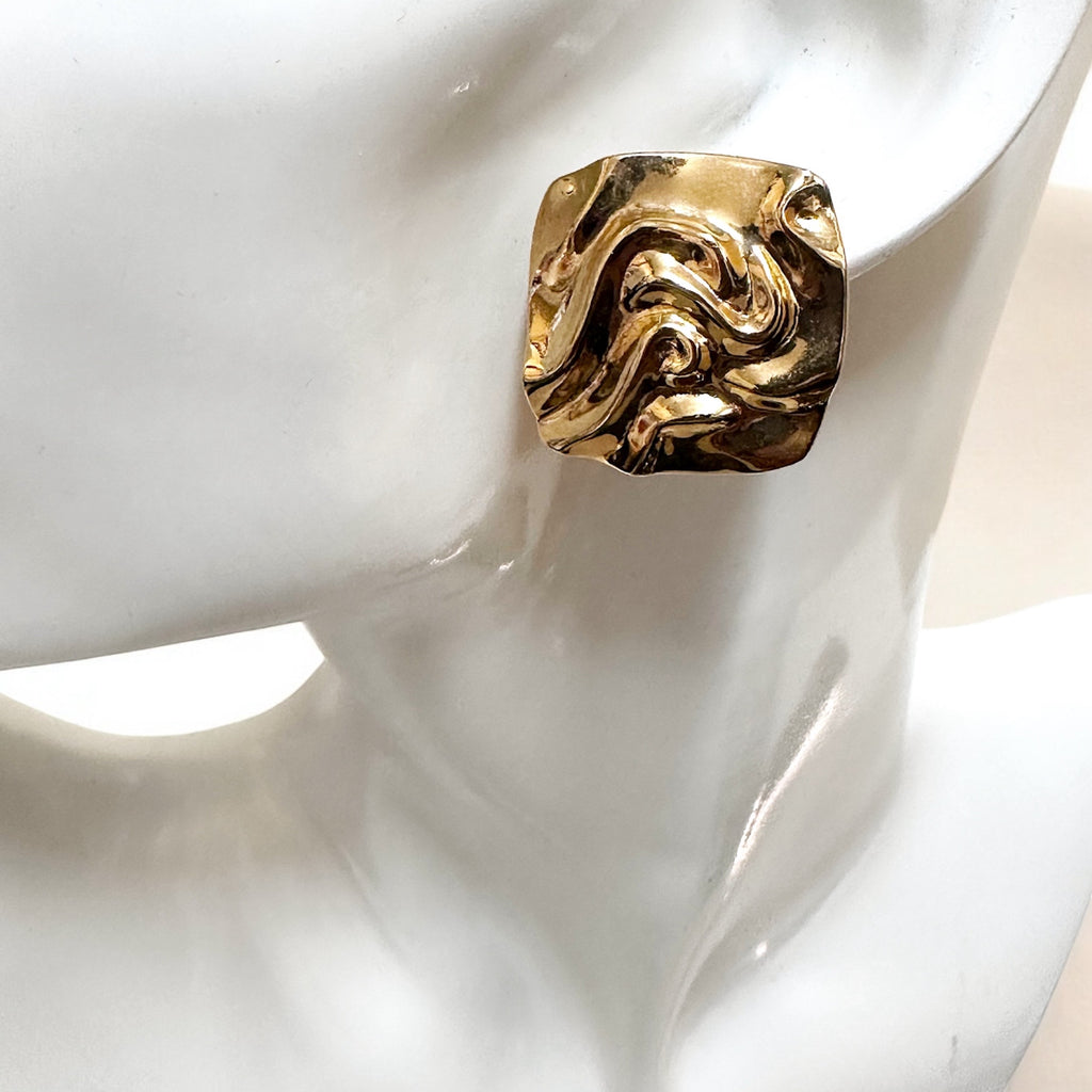 Retro style textured gold plated square clip on earrings.