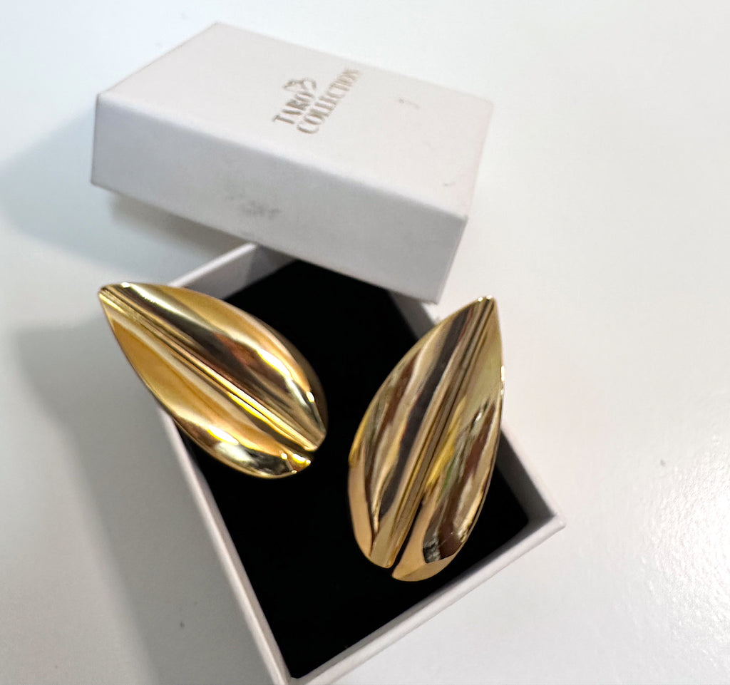 Oversized gold plated over brass leaf statement earrings for pierced ears.