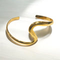 Gold plated wave cuff bracelet geometry