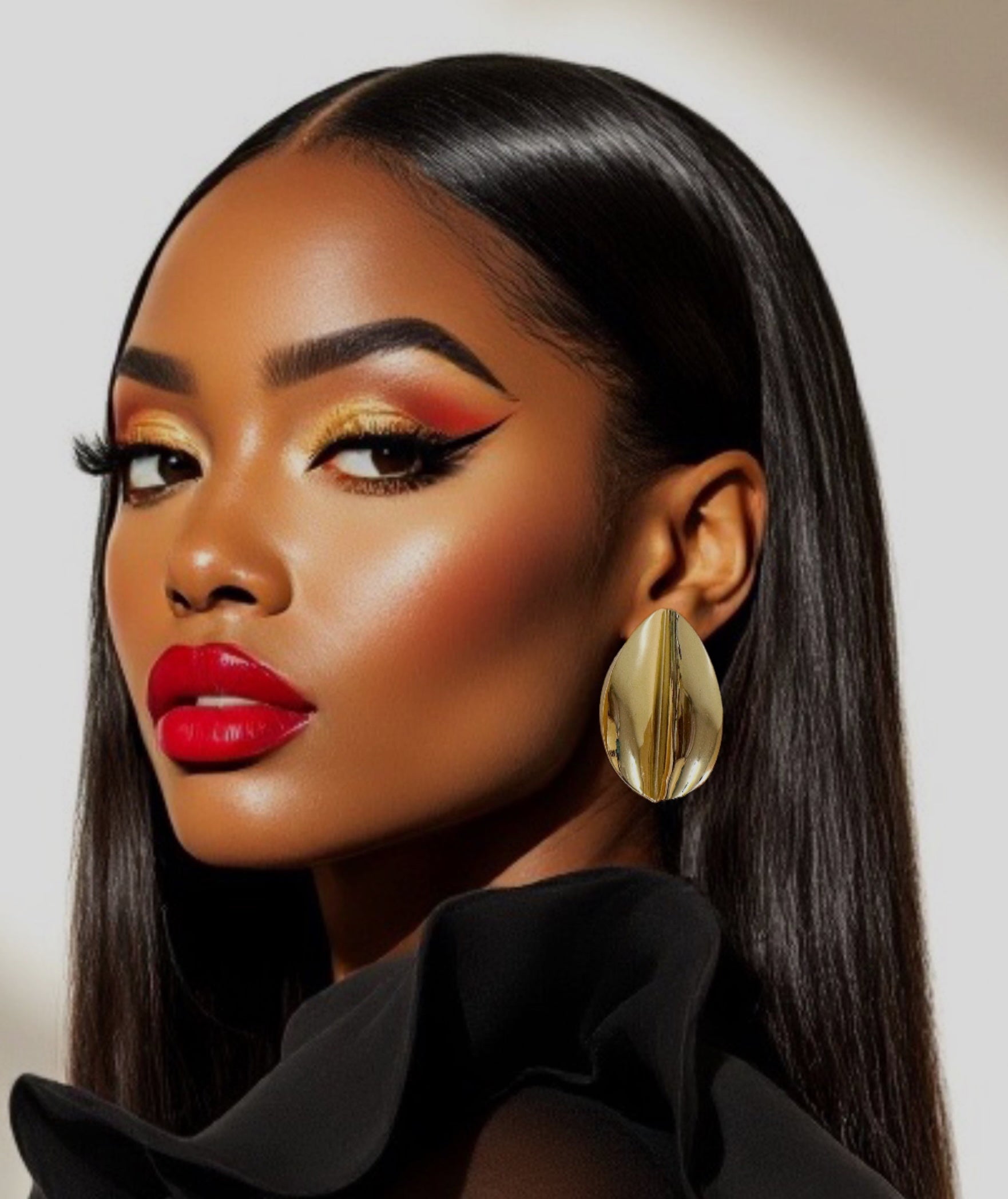 Oversized gold plated over brass leaf statement earrings for pierced ears.